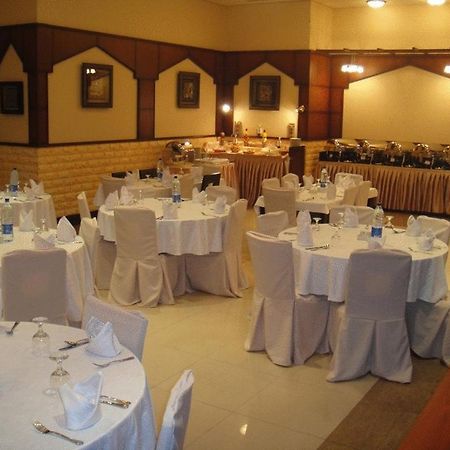 L'Arabia Hotel Apartments Abu Dhabi Restaurant bilde